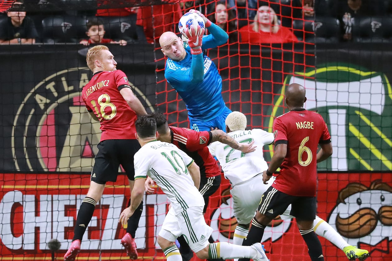Atlanta United goalkeeper Brad Guzan blocks a shot Dec 8, 2018, in Atlanta. He will retire after Saturday's game. (File/AJC)