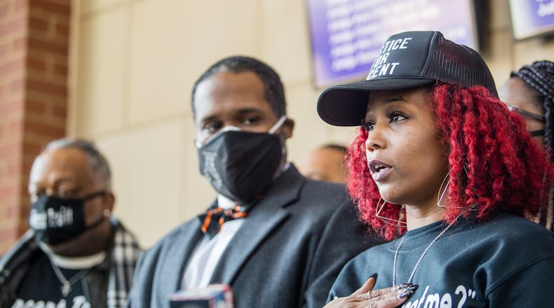 Venethia Cook-Lewis speaks at a news conference Friday about her family's plans to file a $50 million lawsuit against Cobb County following the fatal police shooting of her 17-year-old son, Vincent Truitt, last summer.