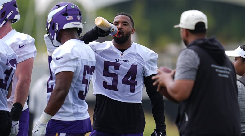 Minnesota Vikings linebacker Jamal Adams (54) hydrates during the team's NFL football training camp Wednesday, July 29, 2026, in Eagan, Minn. (AP Photo/Abbie Parr)