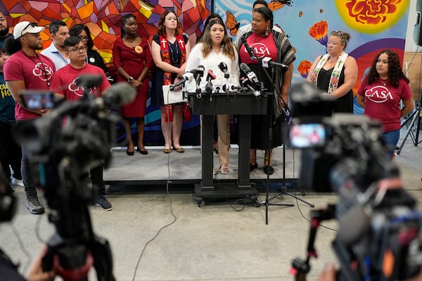 Jennifer Vasquez Sura, center, wife of Kilmar Abrego Garcia speaks during a news conference Wednesday, June 25, 2025, in Nashville, Tenn. (AP Photo/George Walker IV)