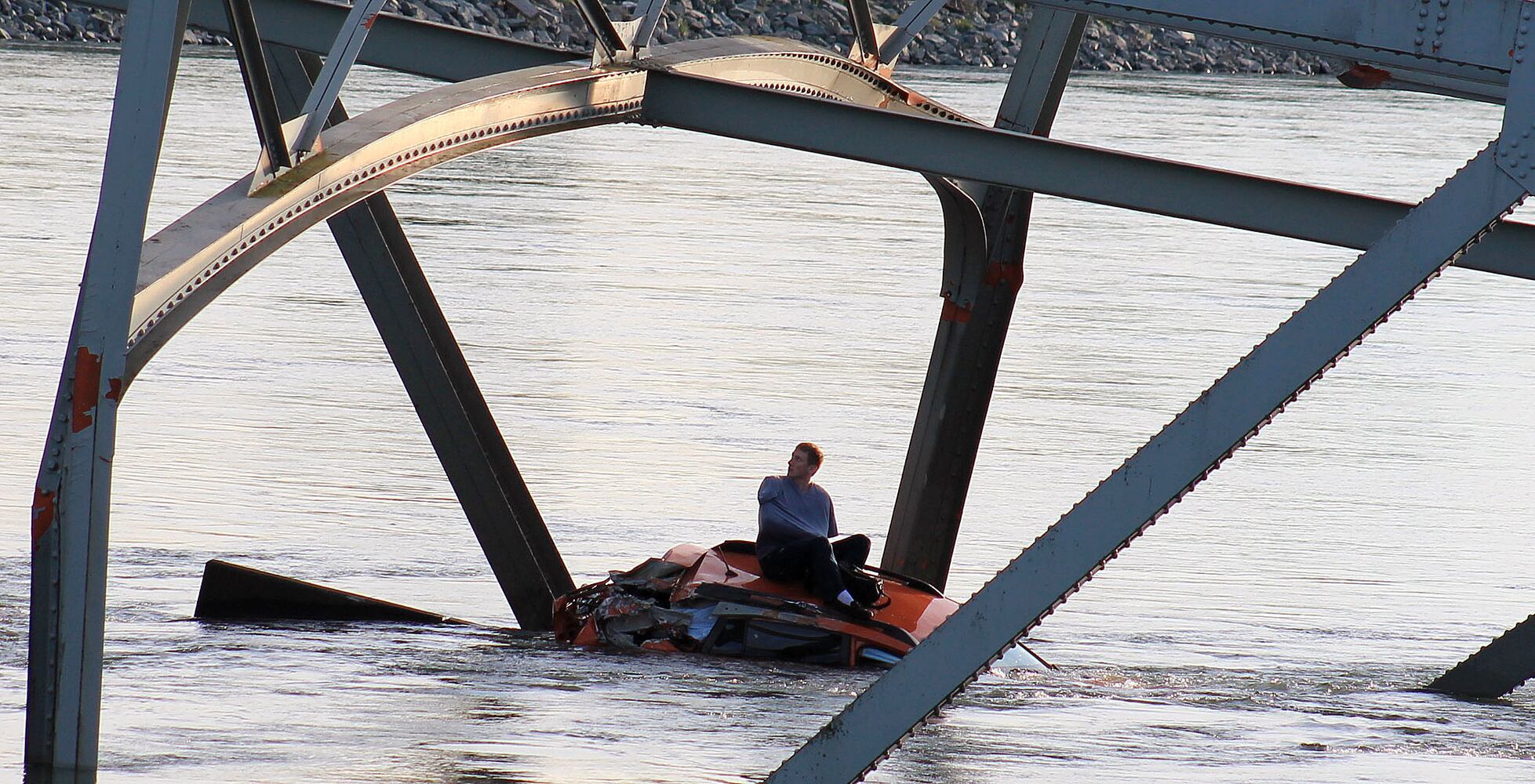 Vehicles, people dumped into water