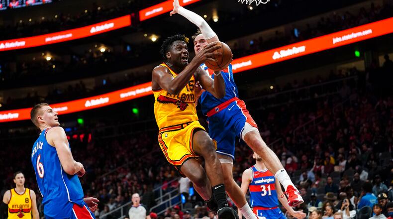 Hawks center Clint Capela will not be available for Game 3 on Friday night against the Heat. (AP Photo/John Bazemore)