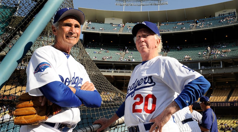 Former Dodger pitchers Sandy Koufax, left, and Don Sutton chat before an old-timers game at Dodger Stadium Saturday, June 8, 2013 in Los Angeles, California. (Wally Skalij/Los Angeles Times/TNS)