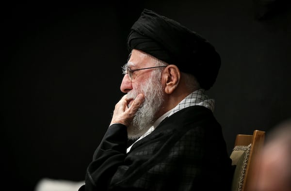 In this photo provided by the Office of the Iranian Supreme Leader, Supreme Leader Ayatollah Ali Khamenei attends a mourning ceremony commemorating the death anniversary of the Prophet Muhammad's grandson, Hussein, in Tehran, Iran, on Saturday, July 6, 2025. (Office of the Iranian Supreme Leader via AP)