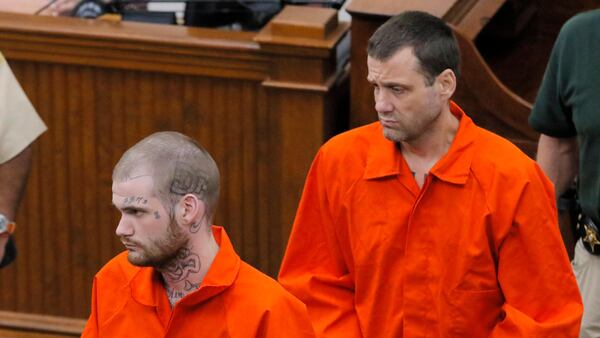 Eatonton, GA - Ricky Dubose (front) and Donnie Russsell Rowe enter the Putnam County courthouse in June 2017 for their first court appearance after they were recaptured. BOB ANDRES /BANDRES@AJC.COM