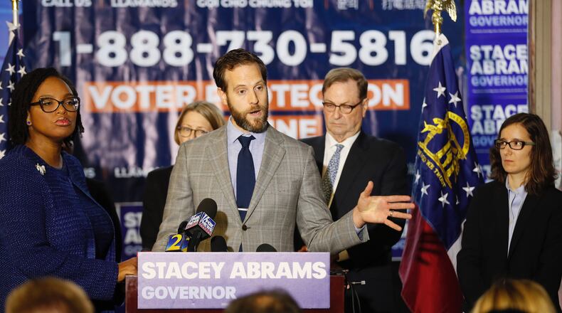 Kurt Kastorf, a member of Stacey Abrams’ litigation team, discusses a lawsuit he plans to file in Dougherty County over absentee ballots. The Abrams campaign held a press conference on Nov. 8, 2018.  Bob Andres / bandres@ajc.com