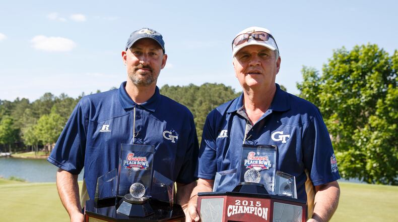 during the 2015 Chick-fil-A Peach Bowl Challenge Round on the Oconee Course at Reynolds Plantation on Tuesday, April 28, 2015. (Chick-fil-A Peach Bowl/Abell Images/Paul Abell) A familiar pose: Georgia Tech coach Paul Johnson and former Tech basketball star Jon Barry with the championship trophy from the Chick-fil-A Peach Bowl Challenge. (Chick-fil-A Peach Bowl/Abell Images/Paul Abell)