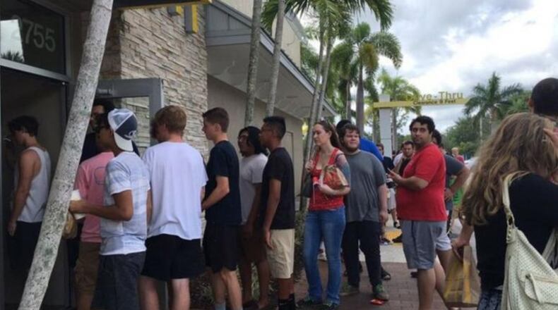 Customers line up for a “Rick and Morty” promotion Saturday outside a McDonald’s in Wellington, Florida. (Photo: Lulu Ramadan/Palm Beach Post)