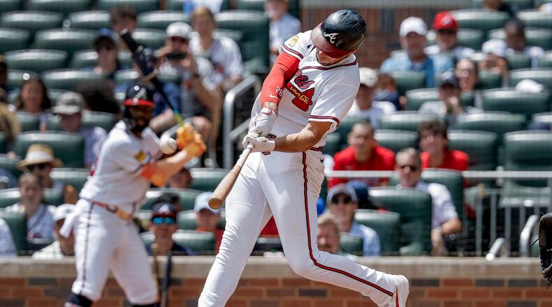 Atlanta Braves' Matt Olson hits a solo home run against the Washington Nationals during the fourth inning of a baseball game, Sunday, Aug. 2, 2026, in Atlanta. (AP Photo/Erik S. Lesser)