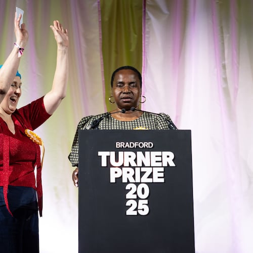 Nnena Kalu, right, is announced as the winner of the Turner Prize 2025 at a ceremony at Bradford Grammar School, in Bradford, England, Tuesday Dec. 9, 2025. (James Speakman/PA via AP)