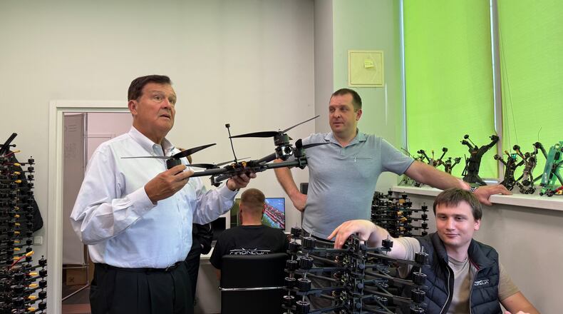 Emory Morsberger holds a drone while at DroneUA in Ukraine in June 2025. (Courtesy of Emory Morsberger)