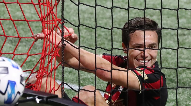Atlanta United forward Erick Torres is all smiles with a face full of net after just missing a shot-on-goal against Cincinnati goalkeeper Spencer Richey Sunday, Nov. 1, 2020, at Mercedes-Benz Stadium in Atlanta. Atlanta United beat Cincinnati, 2-0. (Curtis Compton / Curtis.Compton@ajc.com)