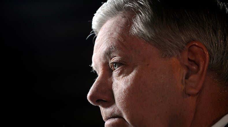 FILE - Sen Lindsey Graham, R-S.C., speaks to the media before the CBS News Republican presidential debate at the Peace Center, Saturday, Feb. 13, 2016, in Greenville, S.C. (AP Photo/Rainier Ehrhardt, File)