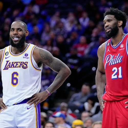 Los Angeles Lakers' LeBron James and Philadelphia 76ers' Joel Embiid play during an NBA basketball game, Friday, Dec. 9, 2022, in Philadelphia. (AP Photo/Matt Slocum, File)