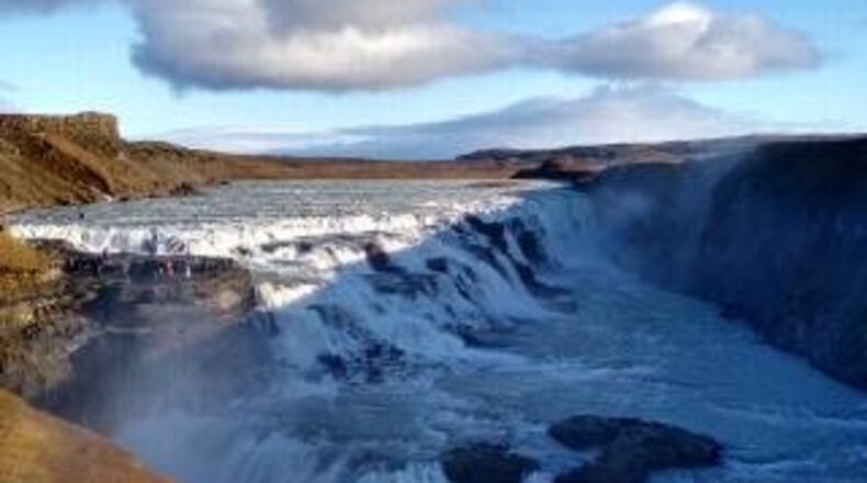 "This is a photo of the Gullfoss waterfall in Iceland, from an October trip," wrote Margaret Thomson of Marietta. "It plunges 105 feet down in two stages.  I have seen Niagara Falls, and this was much more impressive.  Also colder, a high of 33 every day we were in Iceland.  To get a feel for how huge it is, look at the people on the left."