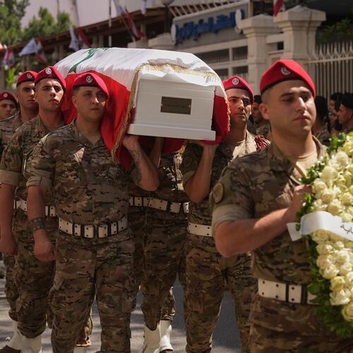 Army soldiers carry the coffin of Brig. Gen. Wissam Sabra, who was killed Saturday in south Lebanon along with a captain and a soldier in an Israeli airstrike, during his funeral procession in Beirut, Sunday, June 7, 2026. (AP Photo/Hassan Ammar)