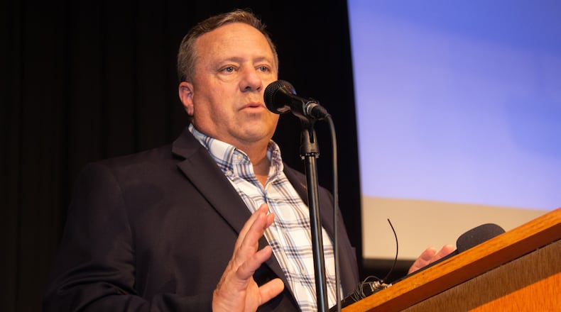 Commissioner, District Two Bob Ott talks to a packed house during a community meeting to address concerns over toxic emissions at Campbell Middle School in Smyrna Tuesday, July 30, 2019. STEVE SCHAEFER / SPECIAL TO THE AJC