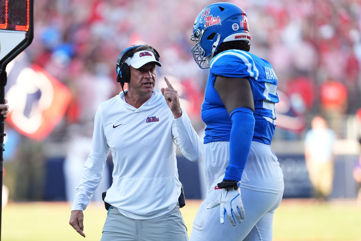 Ole Miss coach Lane Kiffin, pictured during a September game, suggests Vegas oddsmakers could provide a more accurate take on how college football teams should rank rather than the appointed CFP committee that determines the field. (Rogelio V. Solis/AP)