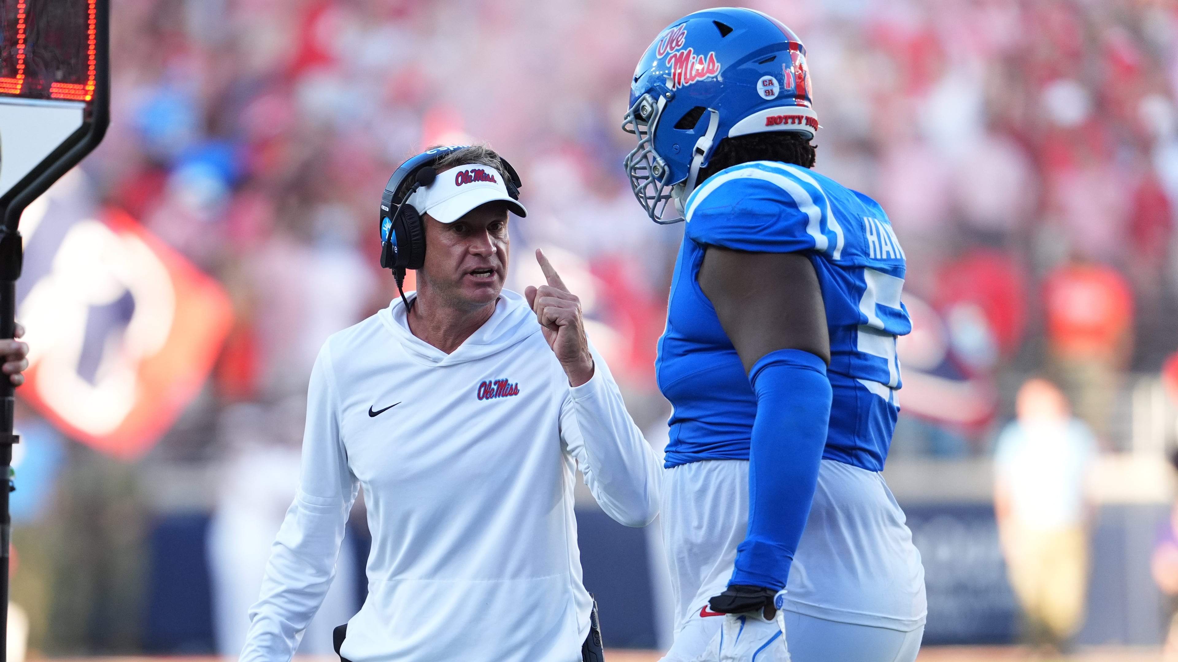 Ole Miss coach Lane Kiffin, pictured during a September game, suggests Vegas oddsmakers could provide a more accurate take on how college football teams should rank rather than the appointed CFP committee that determines the field. (Rogelio V. Solis/AP)