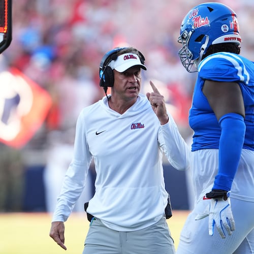 Ole Miss coach Lane Kiffin, pictured during a September game, suggests Vegas oddsmakers could provide a more accurate take on how college football teams should rank rather than the appointed CFP committee that determines the field. (Rogelio V. Solis/AP)