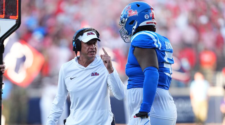 Ole Miss coach Lane Kiffin, pictured during a September game, suggests Vegas oddsmakers could provide a more accurate take on how college football teams should rank rather than the appointed CFP committee that determines the field. (Rogelio V. Solis/AP)