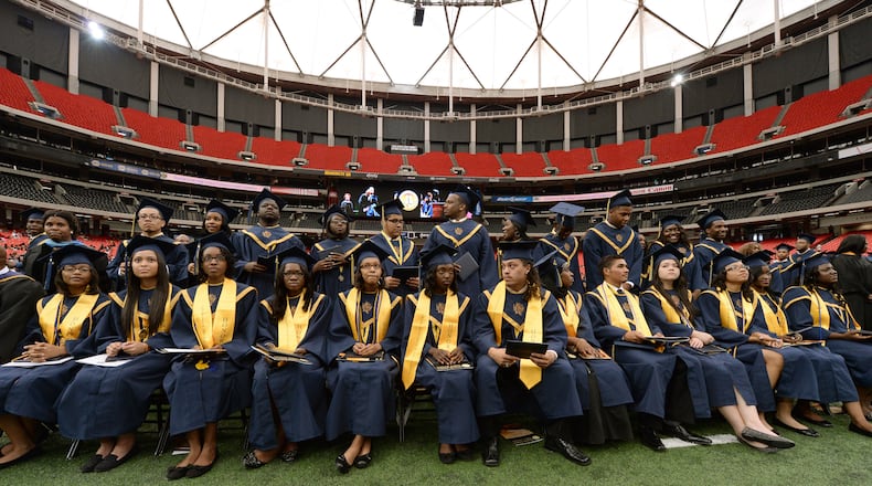 Charles Drew High School students wait for their names to be called during commencement exercises inside the Georgia Dome in this 2013 file photo. All Clayton County high schools will hold 2017 graduations at the International Convention Center in College Park.