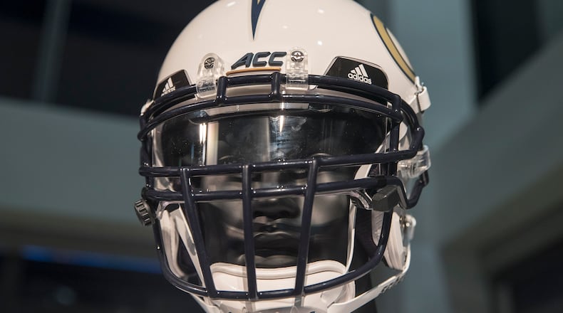 The new Georgia Tech football uniforms are displayed at Ventanas during a uniform reveal party in Atlanta, Friday, August 3, 2018. (ALYSSA POINTER/ALYSSA.POINTER@AJC.COM)