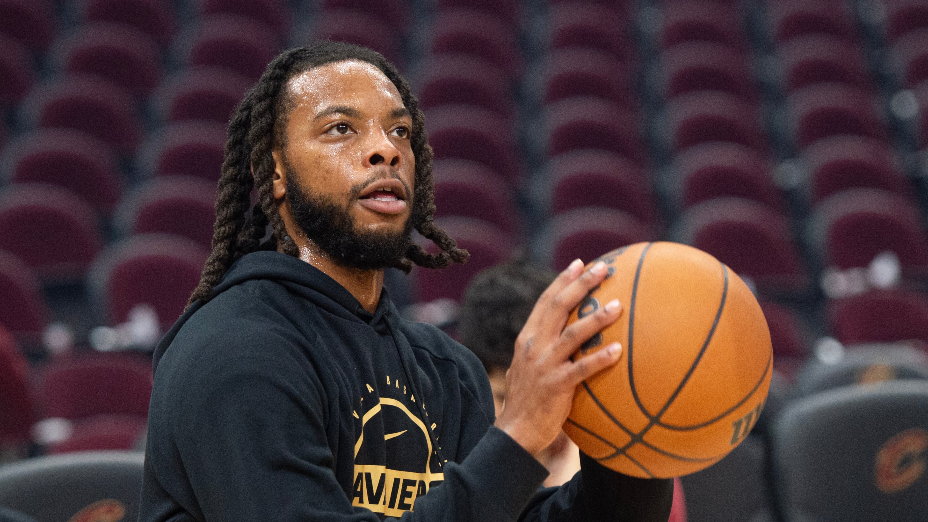 Cleveland Cavaliers' Darius Garland warms up before the start of an NBA basketball game against the Philadelphia 76ers in Cleveland, Wednesday, Nov. 5, 2025. (AP Photo/Phil Long)