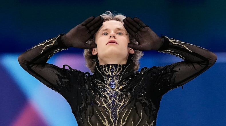 Ilia Malinin of the United States competes during the men's free skate program in figure skating at the 2026 Winter Olympics, in Milan, Italy, Friday, Feb. 13, 2026. (AP Photo/Ashley Landis)