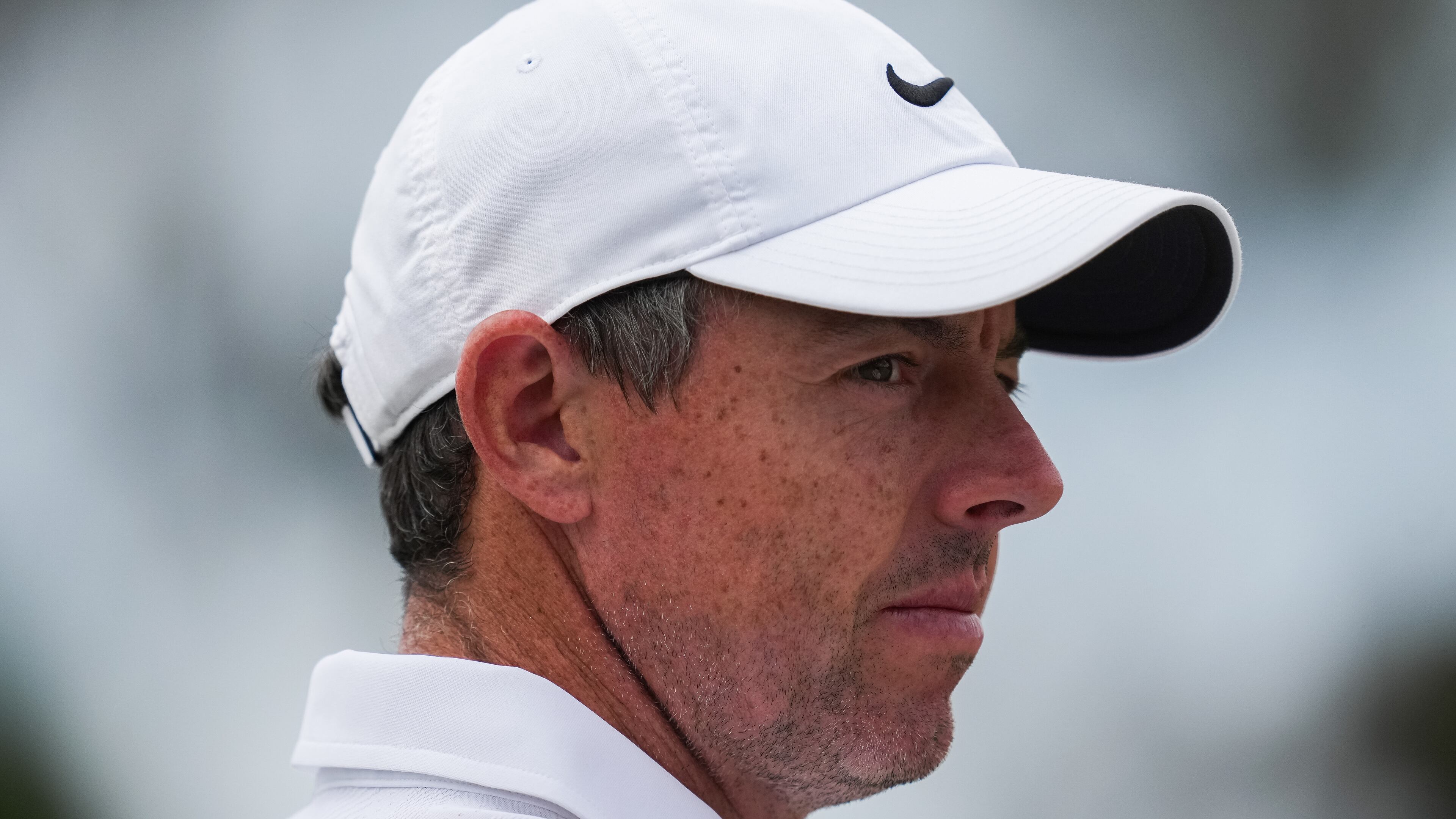 Rory McIlroy of Northern Ireland reacts during the first round of the Australian Open golf tournament in Melbourne, Australia, Thursday, Dec. 4, 2025. (AP Photo/Asanka Brendon Ratnayake)