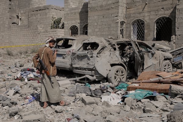 A Yemeni inspects the damage reportedly caused by U.S. airstrikes in Sanaa, Yemen, Monday, April 7, 2025. (AP Photo)