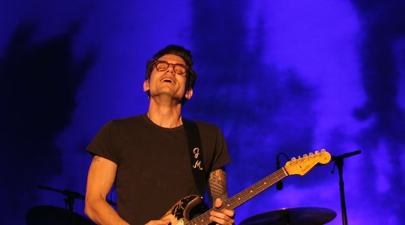Sept 19, 2014 - ATLANTA - Guitar virtuoso, singer/songwriter John Mayer performing Day 1 of Music Midtown at Piedmont Park on Friday.(Akili-Casundria Ramsess/Special to the AJC) John Mayer brought his guitar wizardry to one of the main stages Friday night. Photo: Akili-Casundria Ramsess/AJC