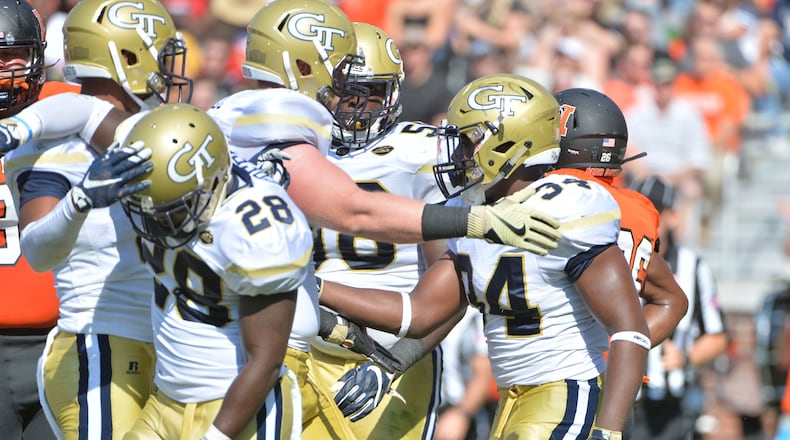 September 10, 2016 Atlanta - Georgia Tech Yellow Jackets running back Marcus Allen (24) is celebrated by teammates after he scored a touchdown in the first half at Bobby Dodd Stadium on Saturday, September 10, 2016. HYOSUB SHIN / HSHIN@AJC.COM