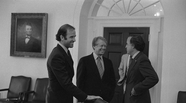 In this picture is from June 14, 1977, Sen. Joe Biden (left) with President Carter (center) and someone else from the Delaware delegation.