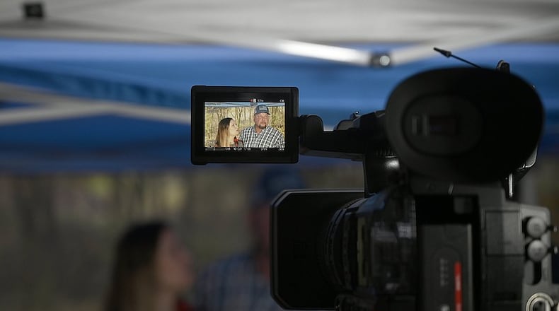 Amber, left, and LeRoy Fletcher speak about the pollution on their property in Dalton at a news conference on Dec. 10, 2024. Members of a team investigating PFAS contamination in Northwest Georgia have been conducting tests across the region to document the extent of contamination. (Courtesy of Abby White)