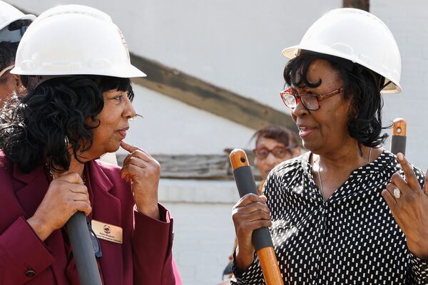 (Left to right) Helen Meadows and Sarah Souder Grigley chat after breaking ground during the ceremony for the renovation of a Rosenwald School in Jonesboro on Wednesday, March 27, 2024. The two became best friends while attending the school, then known as Jonesboro Colored School, from first through eighth grade. (Natrice Miller/ Natrice.miller@ajc.com)