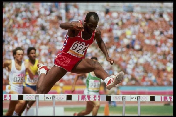 Aug 1984:  Edwin Moses of the USA clears a hurdle on his way to the gold medal in the 400m hurdles during the 1984 Summer Olympics at the Los Angeles Memorial Coliseum in Los Angeles, California.  Mandatory Credit:  David Cannon/Allsport
