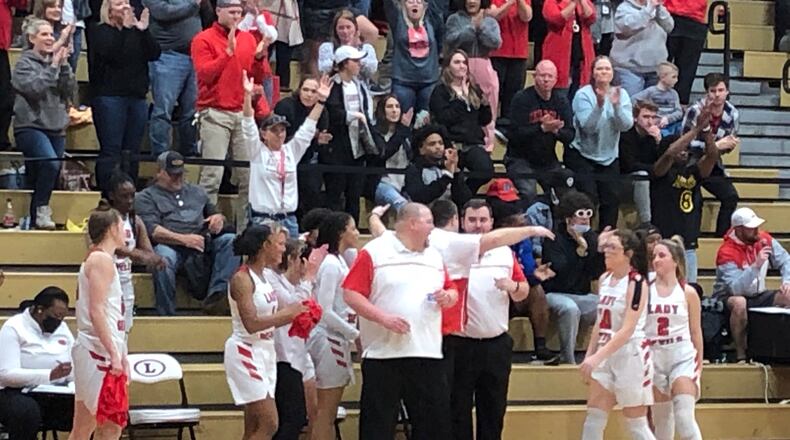 Coach John Zorn directs the Loganville girls in the final minute of their Class 5A playoff win against Maynard Jackson.