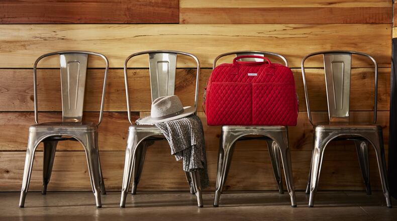 This Vera Bradley cloth bag is perfect for travel needs. CONTRIBUTED