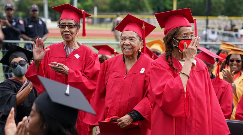 Clark Atlanta alumni stand up to be recognized during Clark Atlanta University’s 33rd Commencement Exercises, at Panther Stadium on Saturday, May 14, 2022, in Atlanta. (Elijah Nouvelage for The Atlanta Journal-Constitution)