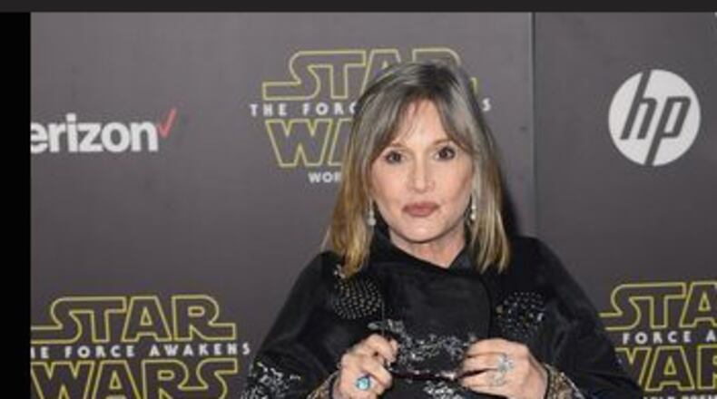 Carrie Fisher at the Hollywood premiere of "Star Wars: The Force Awakens." Photo by Jason Merritt/Getty Images)
