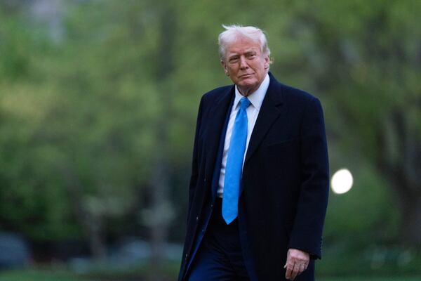 President Donald Trump walks on the South Lawn as he arrives at the White House on Marine One, Sunday, April 6, 2025, in Washington. (AP Photo/Manuel Balce Ceneta)