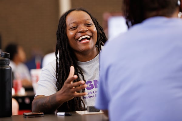 Tabitha White laughs during a drawing exercise at the IGNITE Teacher Residency Program in Stone Mountain on Thursday, July 23, 2026. (Estela Muñoz/AJC)