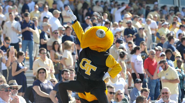 Buzz gestures to the crowd after performing push ups in the first quarter of the Yellow Jackets’ game against the Duke Blue Devils Saturday, October 29, 2016. SPECIAL/Daniel Varnado