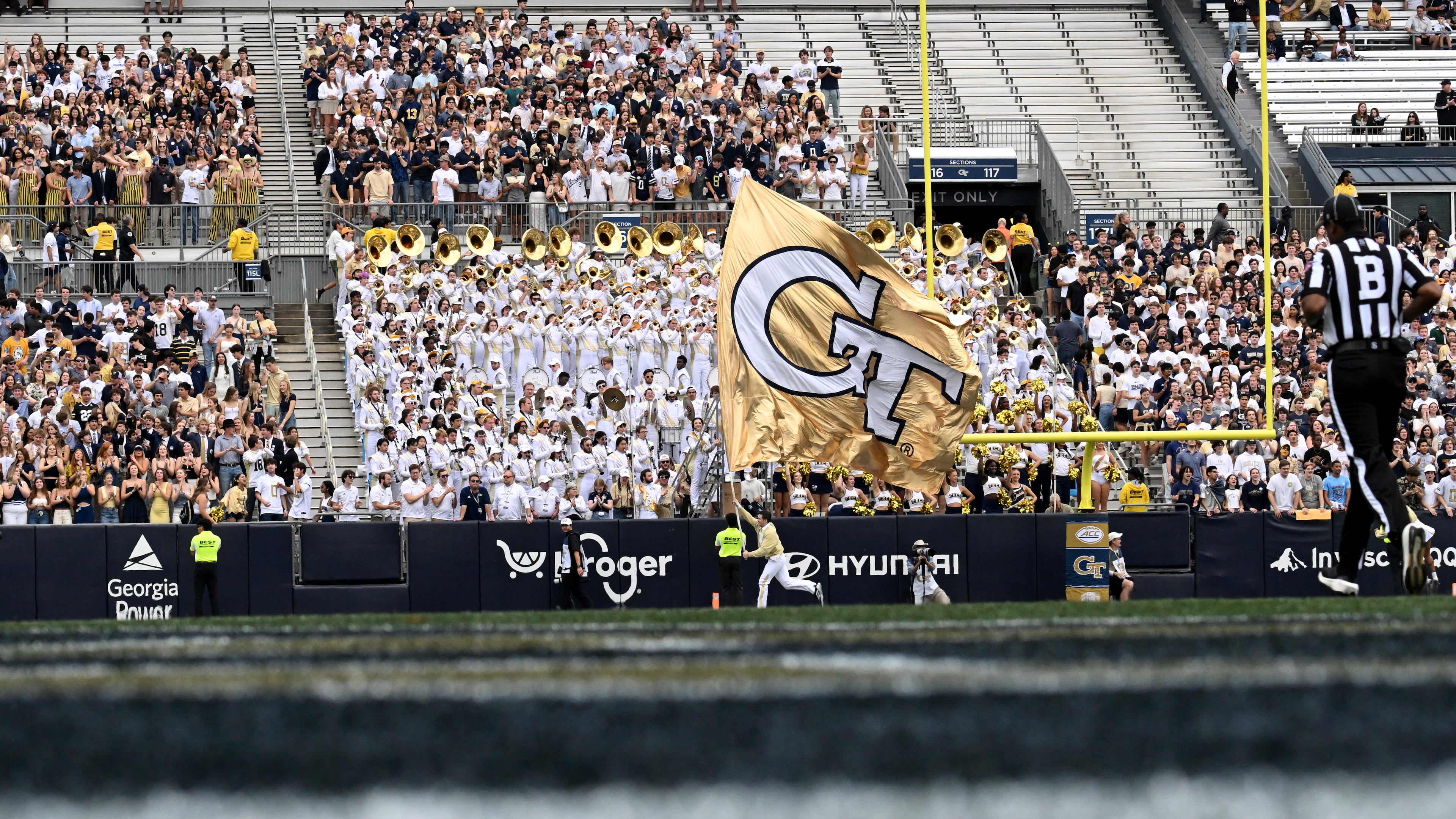 Fans react after scoring a touchdown during the first half of an NCAA college football game at Georgia Tech's Bobby Dodd Stadium, Saturday, Nov. 9, 2024, in Atlanta. Georgia Tech won 28-23 over Miami. (Photo by Hyosub Shin/The Atlanta Journal-Constitution)