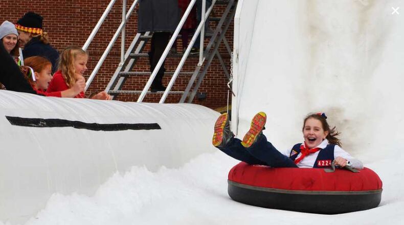 A Day With Santa was going to feature snow tubing in downtown Kennesaw on Dec. 1, 2018. Thanks, rain.