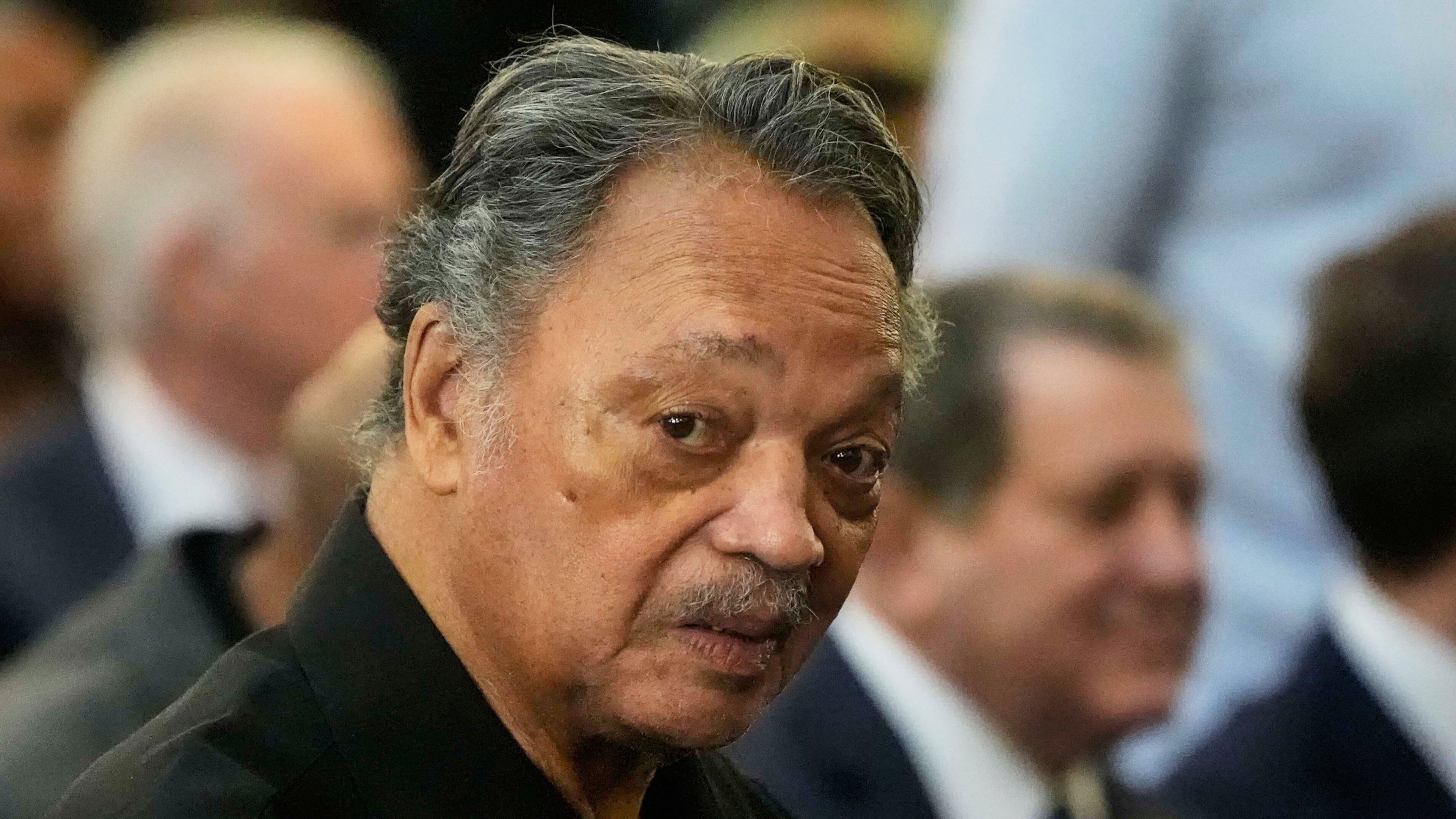 FILE - The Rev. Jesse Jackson listens to speakers at the Tabernacle Baptist Church during the 60th anniversary of the march to ensure that African Americans could exercise their constitutional right to vote, March 9, 2025, in Selma, Ala. (AP Photo/Mike Stewart, File)