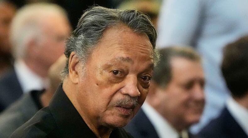 FILE - The Rev. Jesse Jackson listens to speakers at the Tabernacle Baptist Church during the 60th anniversary of the march to ensure that African Americans could exercise their constitutional right to vote, March 9, 2025, in Selma, Ala. (AP Photo/Mike Stewart, File)