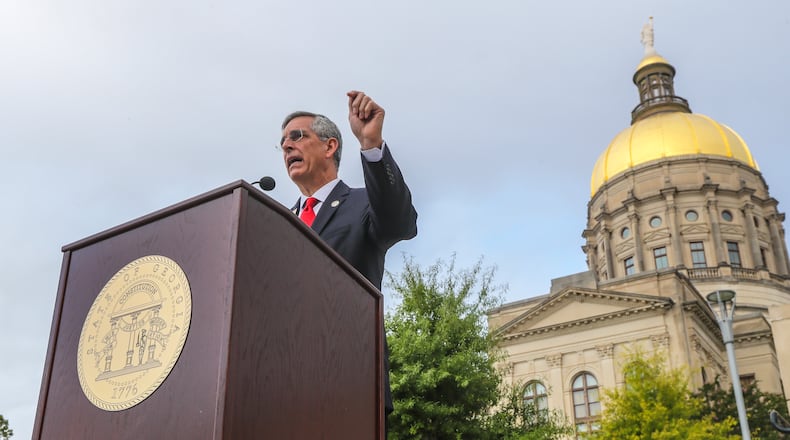 September 8, 2020 Atlanta: Secretary of State Brad Raffensperger announced Tuesday, Sept. 8, 2020 that 1,000 Georgians voted twice in the state’s June 9 primary, a felony that he said will be prosecuted to the fullest extent of the law during a press conference at Liberty Plaza across from the Georgia State Capitol. These voters returned absentee ballots and then also showed up to vote on election day June 9, Raffensperger said. County election officials are able to stop double-voting most of the time, but they weren’t able to catch everyone. “A double voter knows exactly what they’re doing, diluting the votes of each and every voter that follows the law,” Raffensperger said. “Those that make the choice to game the system are breaking the law. And as secretary of state, I will not tolerate it.” Double-voting didn’t change the outcome of any races in the primary, Raffensperger said. (John Spink / John.Spink@ajc.com)