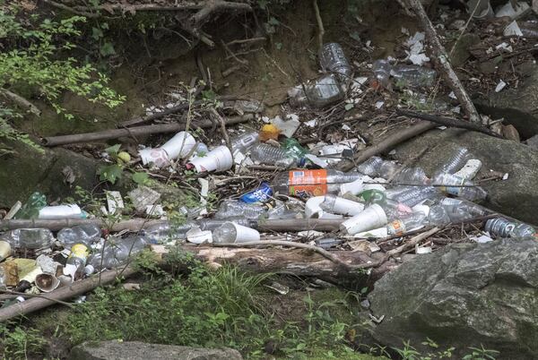 Plastic pollution is a global concern, but there are examples right here in Georgia. Here, trash and plastic pollution cover the banks of the tributary of Proctor Creek in Atlanta. Georgians throw away 1 million tons of plastic each year. Only 9% of total plastic waste in the U.S. gets recycled. BOB ANDRES / BANDRES@AJC.COM